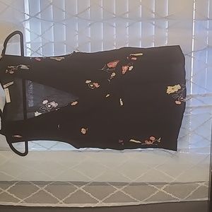 Peplum top. Decorative string tie from L U Q.